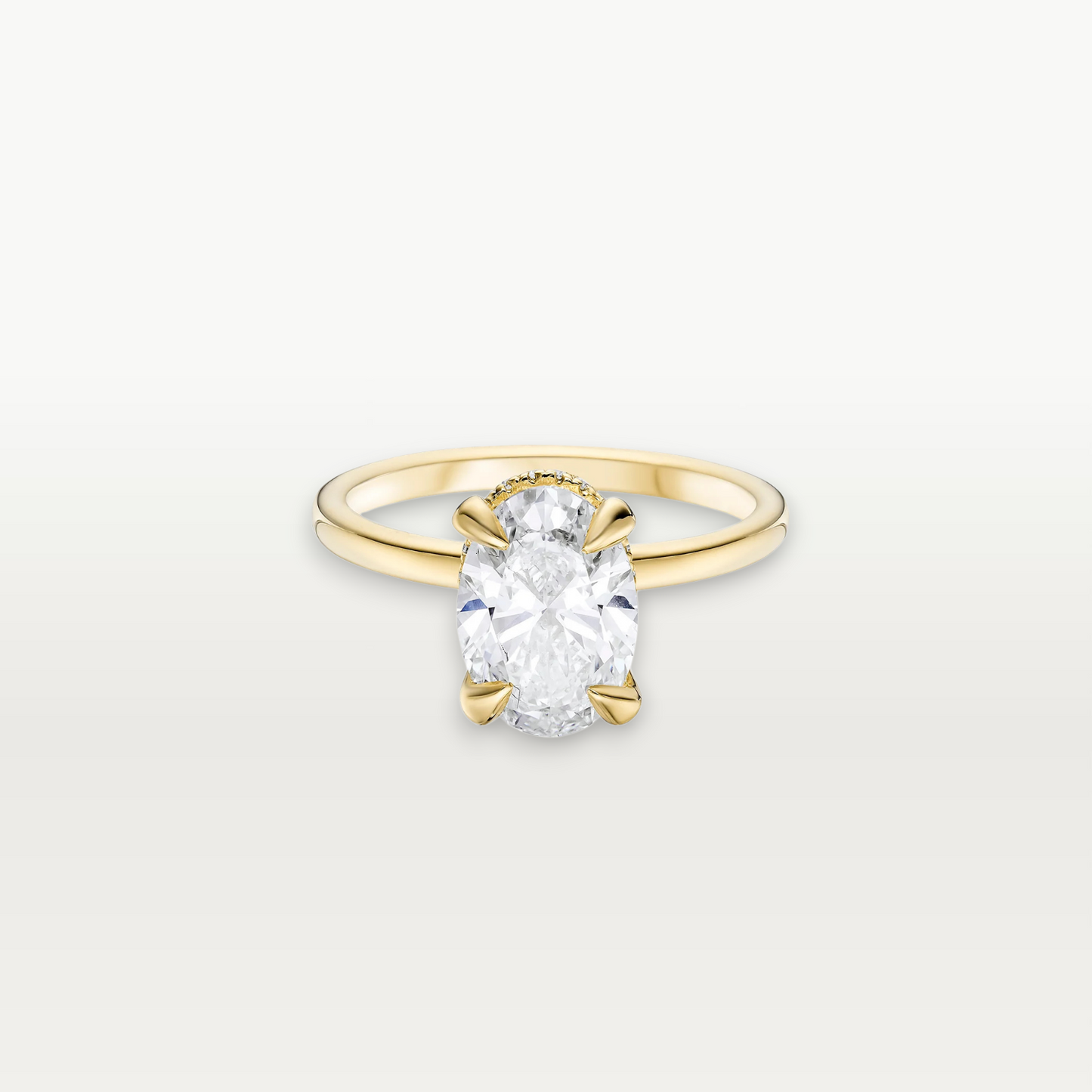 The Solitaire, Oval-cut Diamond Ring with Hidden Halo