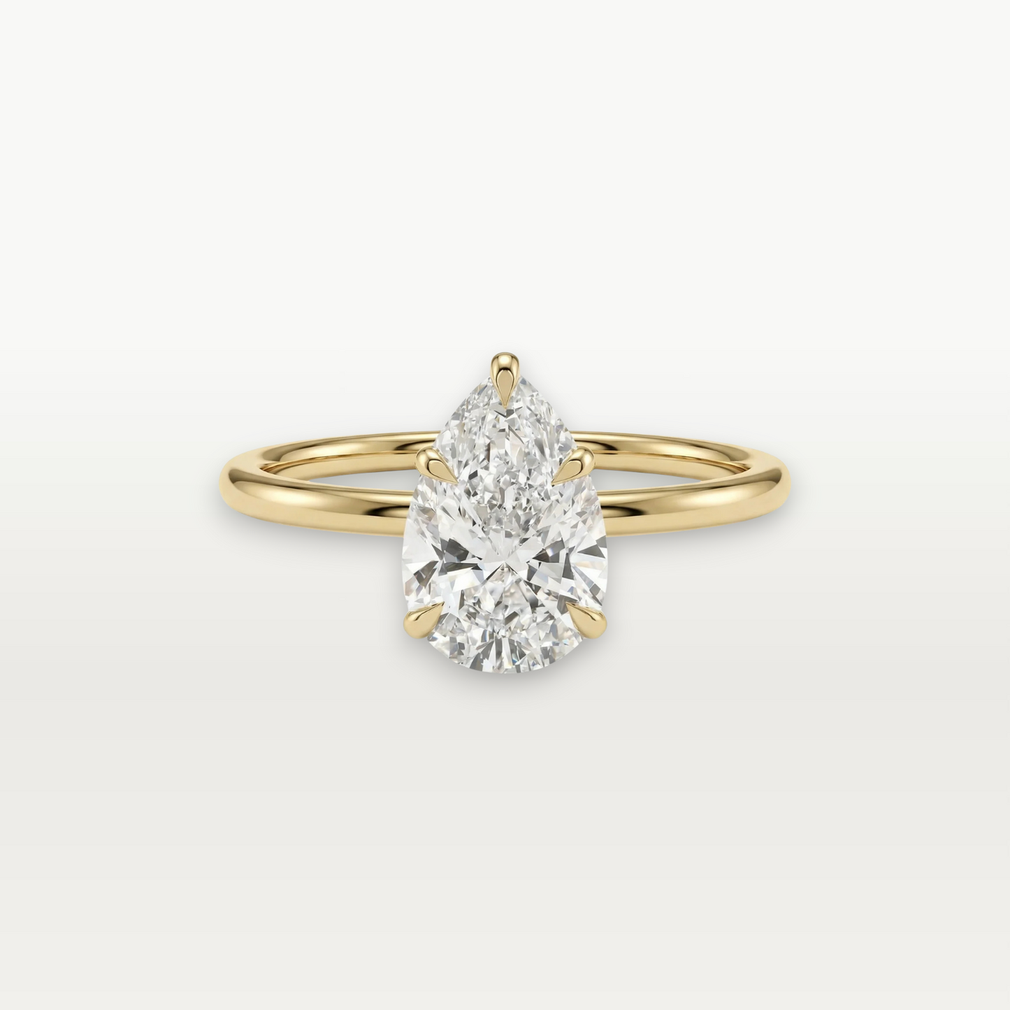 The Solitaire III, Pear-cut Diamond Ring with Wrapped Hidden Halo